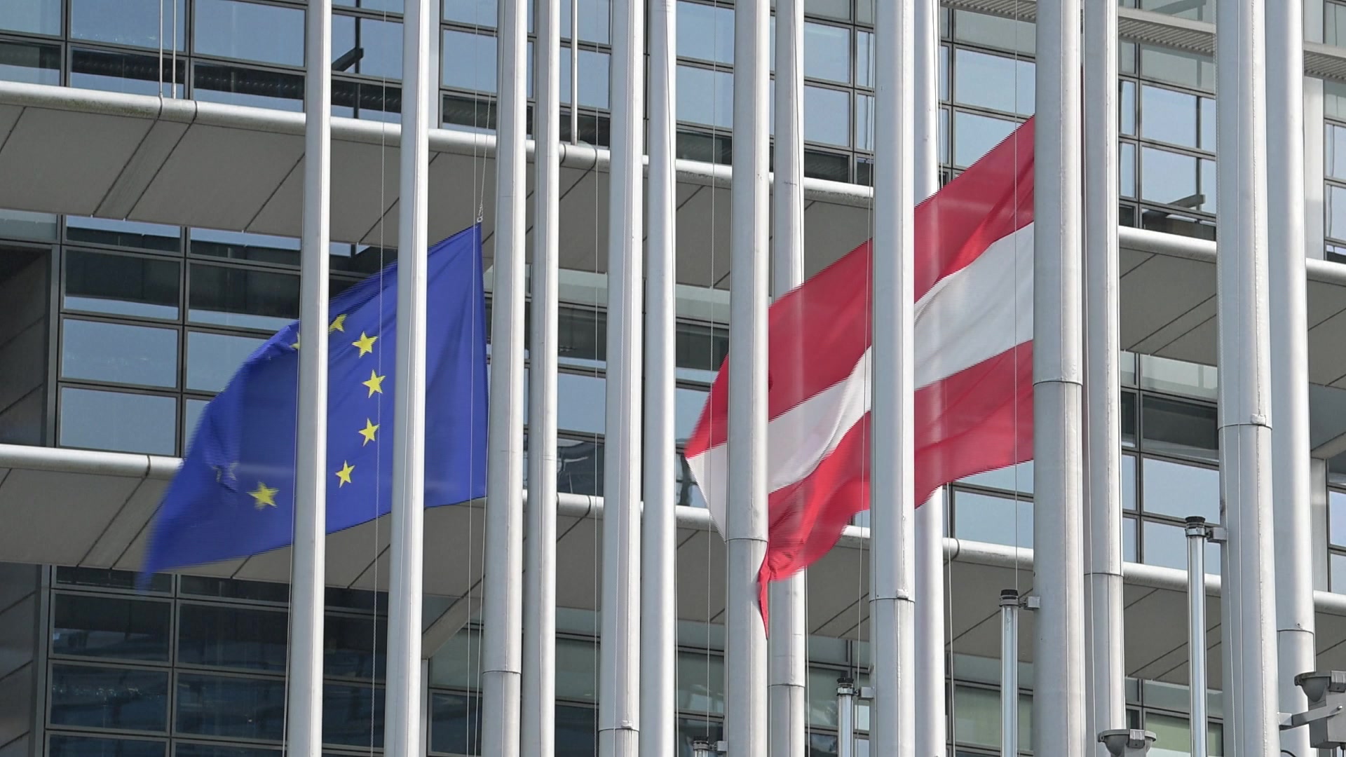 European and Austrian flags at half-mast in front of EP Buildings in Brussels and Strasbourg as a sign of solidarity following the school shooting in Graz (Austria)